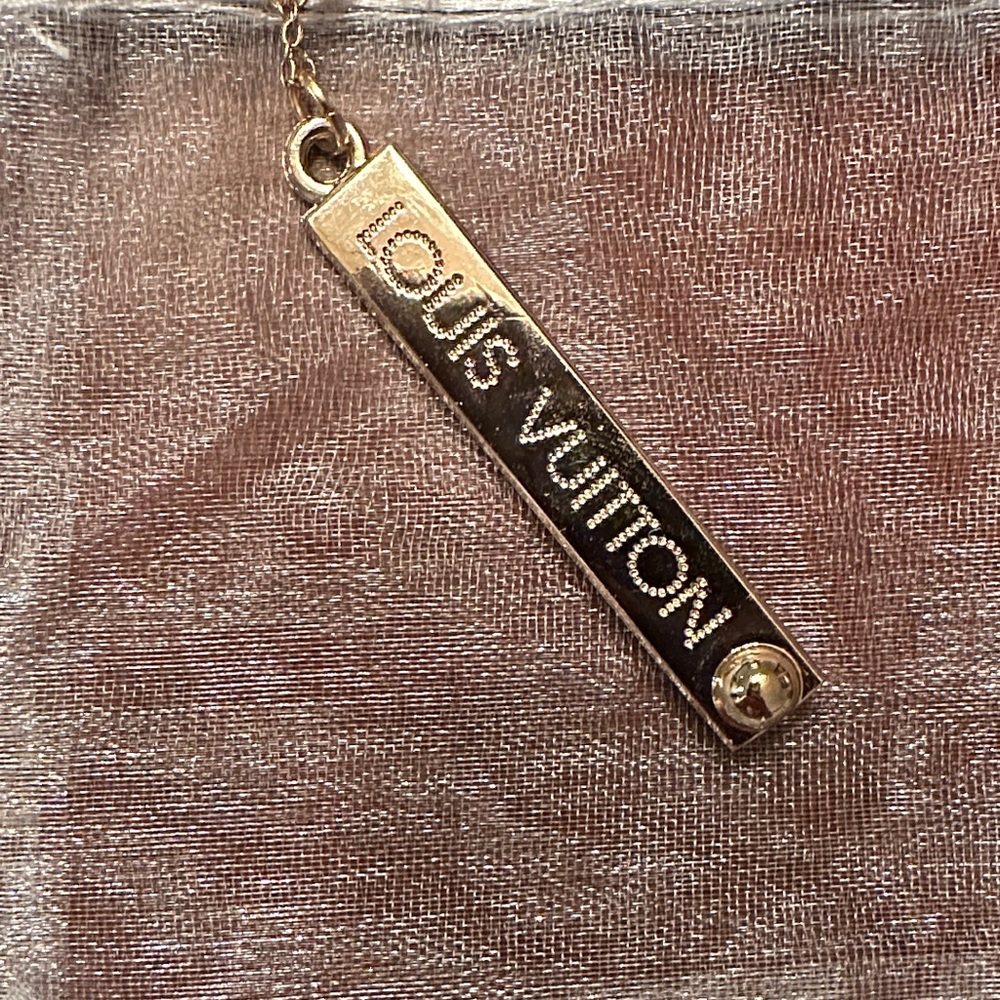 Authentic Louis Vuitton Large Lola bar charm on chain - Picture 2 of 3